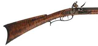 Southern Mountain Rifle,
.40 caliber,  46" Rice swamped barrel,
Ketland flintlock, curly maple, iron trim, used